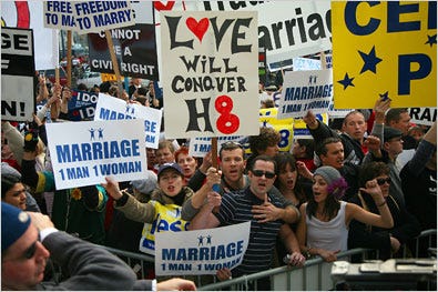 Hundreds of people on both sides of the argument over California’s Proposition 8 demonstrated Thursday outside the Earl Warren Building in San Francisco.