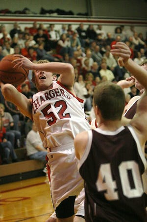 Orion’s Caleb Nesbitt goes up for two points in the Rockridge game on Friday, Feb. 20, in the Charger gym.