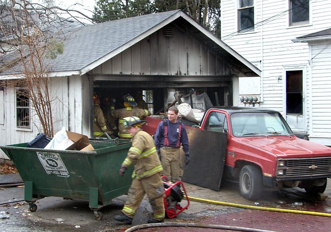 Topeka fire crews put out a garage fire this afternoon at 710 S.W. 7th. Firefighters were able to contain the blaze and prevent it from spreading to two nearby vacant houses.