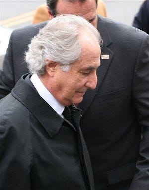 Bernard Madoff arrives at Manhattan federal court for a hearing to discuss potential conflicts of interest between him and his lawyer, Tuesday, March 10, 2009, in New York.