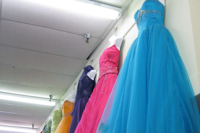 Some students are shopping at local consignment shops like Twice As Nice and Deja Vu to try and save money for prom. (Ashley Boyd/Tuscaloosa News)