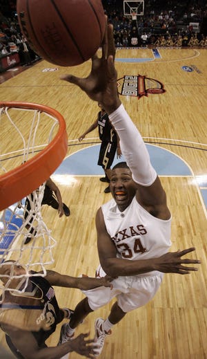 Texas' Dexter Pittman scored a career-high 26 points and grabbed 10 rebounds against Jermyl Jackson-Wilson and Colorado during Wednesday's Big 12 Tournament game.
