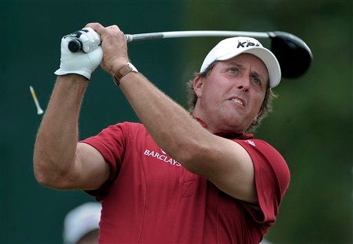 Phil Mickelson tees off on the second hole during the second round at the CA Championship golf tournament Friday, March 13, 2009, in Doral, Fla.
