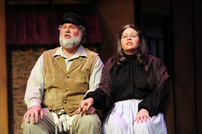 Stafford and Rebecca Turner, as Tevye and Golde, rehearse for Converse College’s production of “Fiddler on the Roof” this week. The Turners will celebrate 25 years of marriage this year.