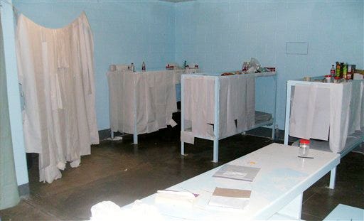 This undated handout photo provided by the Montague County Sheriff shows paper obscuring the bedding area of the multiple occupancy area of the jail, before the it was refurbished in Montague, Texas. Sheriff Paul Cunningham said he was stunned while touring the jail for the first time just hours after being sworn into office Jan. 1, 2009. Among other things, he saw what appeared to be a rack made of nails, paper towel partitions that blocked jailers' views into cells and pills scattered openly about. Cunningham, who had not worked for the county before his November election, immediately ordered the jail closed and moved the nearly 60 inmates to a nearby facility. (AP Photo/Montague County Sheriff)