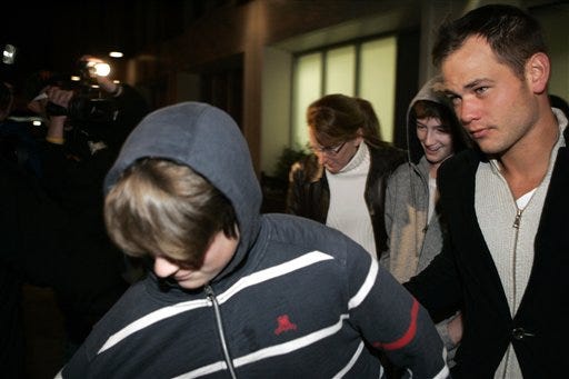 Micheal Richard Antonio Neeson, second from right and his brother Daniel Jack Neeson, left, sons of actress Natasha Richardson leave Lenox Hill Hospital in New York early Wednesday morning, March 18, 2009. Others are unidentified. (AP Photo/David Karp)