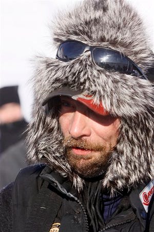Defending Iditarod champion and current leader Lance Mackey talks after arriving at the White Mountain, Alaska checkpoint on the Iditarod Trial Sled Dog Race Tuesday, March 17, 2009.