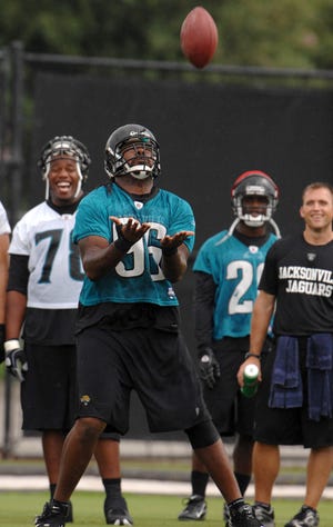 RICK WILSON/The Times-UnionJaguars defensive tackle Tony McDaniel fields a kickoff during a special-teams training camp practice last July. McDaniel is expected to be traded to the Dolphins today.