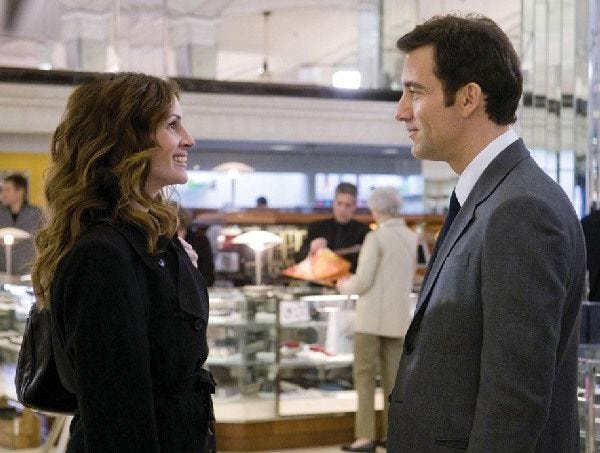 Julia Roberts, left, and Clive Owen are shown in “Duplicity.”
