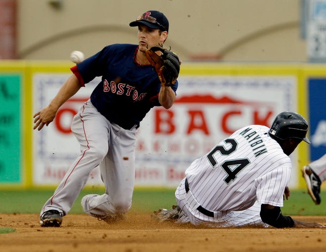 Florida's Cameron Maybin steals second base as Red Sox second baseman Nick Green takes the throw on Saturday.