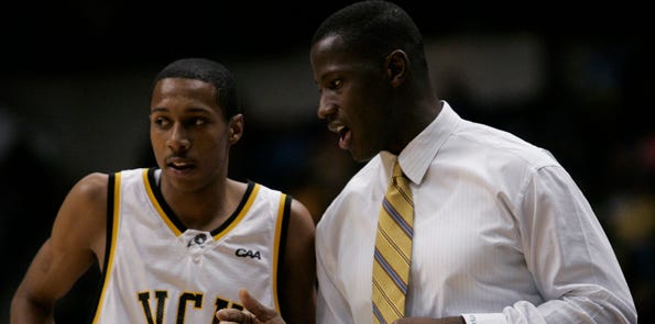 Virginia Commonwealth head basketball coach Anthony Grant talks with guard B.A. Walker (20) during the final moments of their 63-56 win over Drexel in a Colonial Athletic Association semifinal college basketball game in Richmond, Va., March 4, 2007.