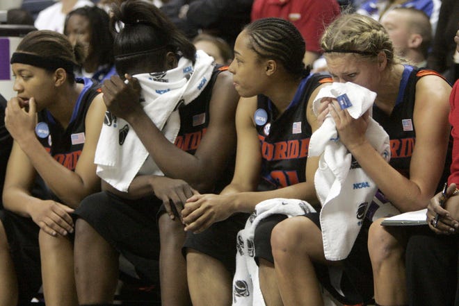 Members of the Florida team watch from the bench near the end of a second-round game against Connecticut in the NCAA women's college basketball tournament in Storrs, Conn., on Tuesday.