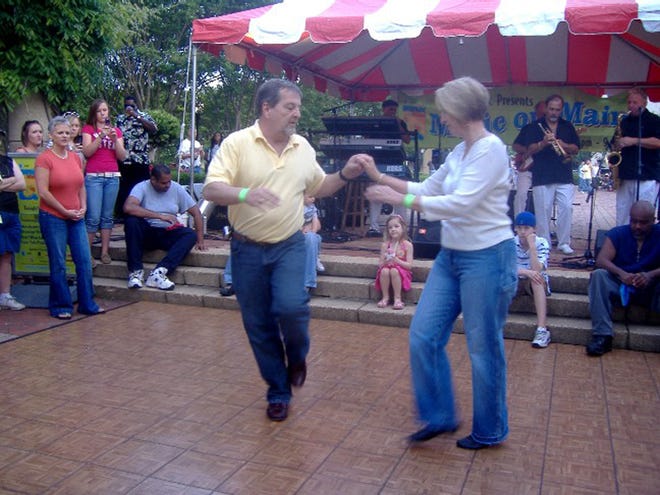 Steve and Kathy Day dance during a Music on Main event last year. The couple will be teaching others how to do the shag Friday night at the Spartanburg Marriott.