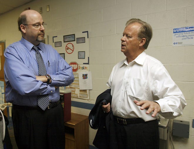 Tony P. Hall, right, talks with Barry Feaker during a tour Thursday of the Topeka Rescue Mission. Hall is a former congressman from Ohio and is the featured speaker at today's Kansas Prayer Breakfast at the Ramada Hotel and Convention Center.