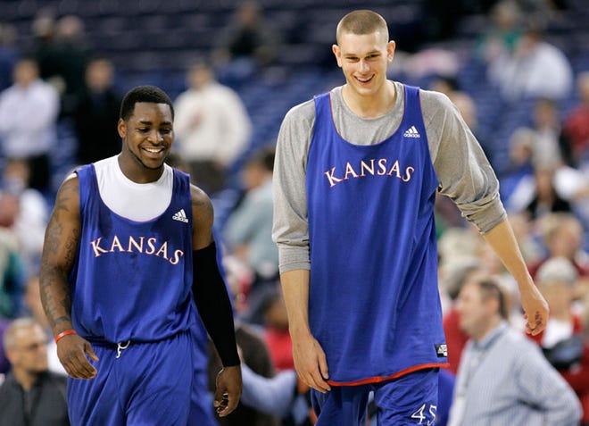 Sherron Collins (left) and Cole Aldrich have carried KU much of the season, but they'll need better support Friday night against physically tough Michigan State in a Sweet 16 game.