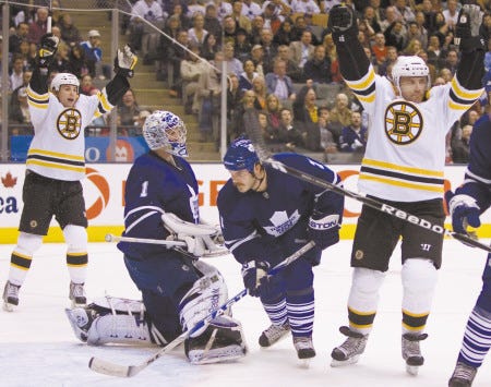 Bruins forward Mark Recchi celebrates one of his two goals during Saturday’s 7-5 win over Toronto.
