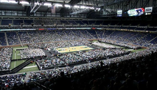 In this Dec. 3, 2008 file photo, Ford Field in Detroit is seen during the first half of an NCAA college basketball game between North Carolina and Michigan State. The road to the Final Four ends in the Motor City, where the NCAA will start a new tradition by putting a basketball court in the middle of a football field. Kansas coach Bill Self hopes his team gets a chance to defend its national title at Ford Field, but it doesn't mean he will like the venue for hoops. (AP Photo/Carlos Osorio)