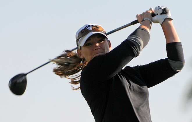 Kristy McPherson hits from the 11th hole during the second round of the LPGA Kraft Nabisco Championship golf tournament in Rancho Mirage, Calif. McPherson shared the lead with Christina Kim after two rounds of play.