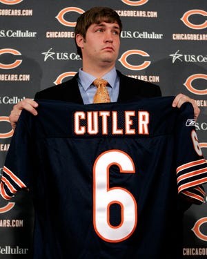New Chicago Bears quarterback Jay Cutler poses for a photo during a news conference Friday,in Lake Forest, Ill.