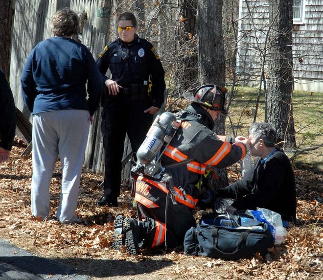 Hyannis firefighters treat a reported burn and smoke inhalation victim at the scene of a house fire at 22 Brian Lane in Hyannis. The cause of the victim’s injuries are unknown at this time.