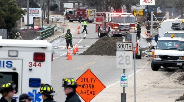 Dennis fire personnel and gas workers man the scene of a broken gas main on Route 28 last month. Deadly explosions, including one in Somerset in February, underscore the dangers of gas line breaks.