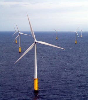 In this 2004 photo supplied by Vestas Wind Systems offshore wind turbines at North Hoyle in Wales, western Britain, is shown. Windmills off the East Coast could generate enough electricity to replace most, if not all, the coal-fired power plants in the United States, Interior Secretary Ken Salazar said Monday, April 6, 2009. (AP Photo/Vestas Wind Systems, file)