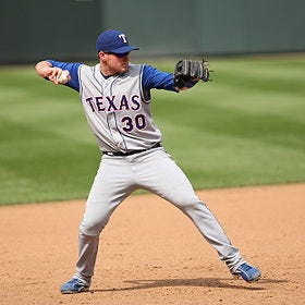 Former Wamego High and KU product Travis Metcalf played in 60 games over the past two seasons for Texas before the Royals acquired him Wednesday.