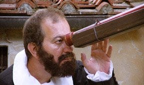 An actor portrays Galileo peering through his telescope in the PBS documentary "400 Years of the Telescope: A Journey of Science, Technology and Thoughts."
