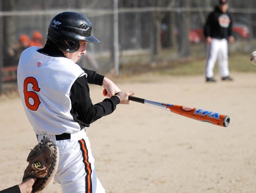 Dave Manley / The Journal-Standard
Milledgeville/Polo's #6 hits during the game Wednesday at Forreston.