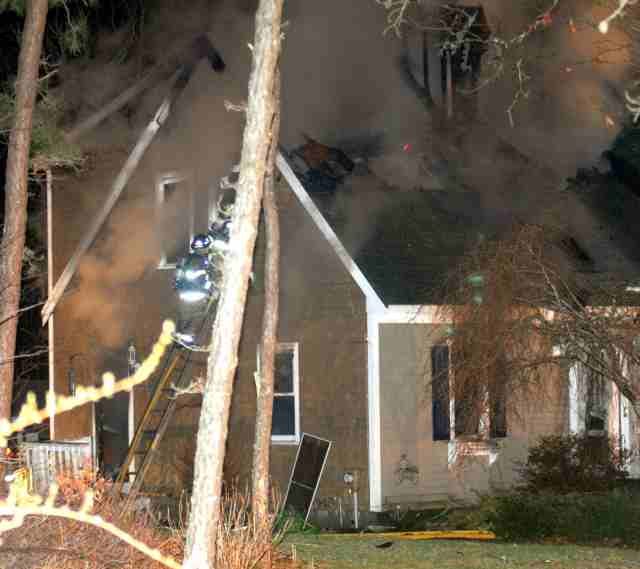 Plymouth firefighters battle a two alarm house fire at 86 Bournehurst Drive Thursday morning. The fire broke out around 12:30 AM. There were no reported injuries at the fire scene. The home was reportedly unoccupied at the time of the fire. The Bourne, Wareham and Kingston fire departments provided mutual aid station coverage during the fire.