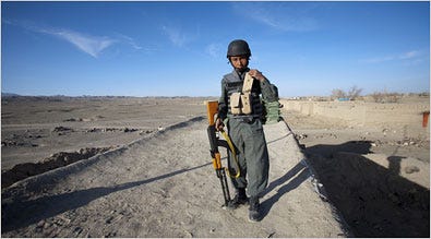 Graft has left the Afghan police ineffective and undersupplied. An officer in Ghazni Province, above, was issued only one magazine of ammunition for his rifle.