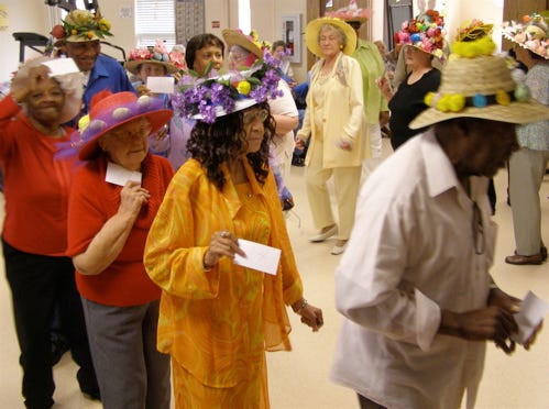 An Easter parade of bonnets strolls through the Ascension Council on Aging in Gonzales Thursday during the Annual COA Easter Spring Fling. Thirty-five seniors competed in the Easter bonnet parade. More than 100 seniors attended the event which also included refreshments, an Easter egg hunt, music by local musician Clif Nickens and lunch.