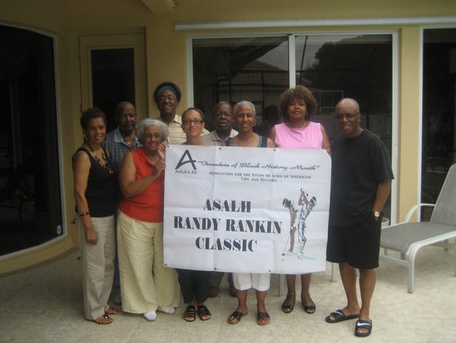 This year's Randy Rankin Classic committee members include, from left: front, Lois Watson, Jean McMurren, Ellen Shortridge, Corene Richardson, Sherry Suggs and Charles Shortridge; and back, Lionel McMurren, Joseph Segars and Henry Richardson. PHOTOS PROVIDED BY MANASOTA ASALH
 Joseph Bornstein, left, executive director of the KBR Foundation, presents a check to ASALH President Corene Richardson in support of the 10th annual Randy Rankin Scholarship Classic. Also shown are KBR board member Lynn Bornstein and Henry Richardson, the classic's co-chairman. ASALH Scholarship Committee members Arlene Greene, left, and Joan Byrd were bridge winners at last year's Randy Rankin Scholarship Classic. The late Randy Rankin.