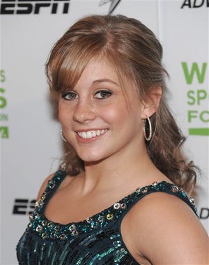 This Oct. 14, 2008, file photo shows Shawn Johnson, 2008 United States Olympic balance beam gold medalist, at the 29th Annual Salute to Women In Sports Awards Dinner at the Waldorf-Astoria in New York. (AP Photo/Evan Agostini, file)