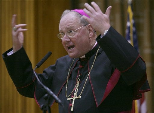 Archbishop Timothy Dolan speaks during a news conference in New York, Wednesday, April 15, 2009. He will be formally installed Wednesday as Roman Catholic Archbishop of New York. (AP Photos/Bebeto Matthews)