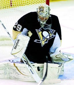 The Times/KEVIN LORENZI 04/15/2009Penguins' goalie Marc-Andre Fleury makes a stop during the Pittsburgh Penguins' first round playoff game against the Philadelphia Flyers on Wednesday, April 15, 2009.