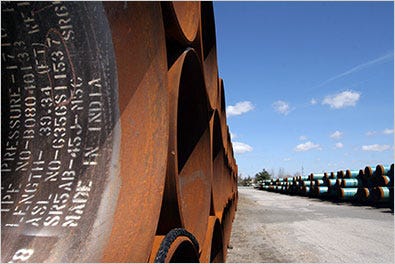 Steel pipes marked "Made in India" sat ready for the Canada-to-Oklahoma pipeline at the Port Authority in Granite City, Ill.