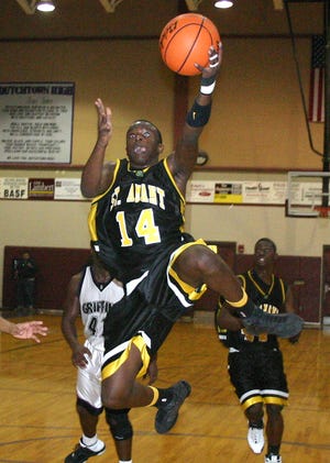 St. Amant’s Brandon Morris recently signed a basketball scholarship with Xavier University.
