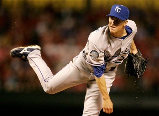 Kansas City Royals starting pitcher Zack Greinke delivers to the Texas Rangers in the ninth inning Saturday in Arlington, Texas. Greinke gave up seven hits and no runs in the Royals' 2-0 win.