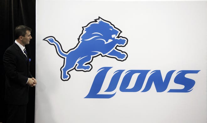Detroit Lions president Tom Lewand unveils the new team logo in Madison Heights, Mich., Monday April 20, 2009. The team's comprehensive new brand includes a new logo, new uniforms and other branding elements.