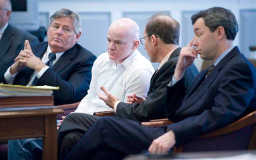 Jerry Buck Inman, second left, speaks with attorney Simms Culbertson and members of his defense team during the sentencing phase of his trial Monday for the May 2006 killing of Clemson University student Tiffany Souers.