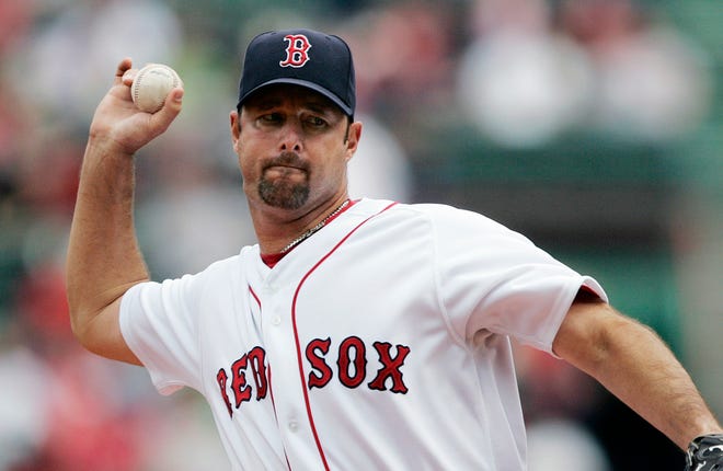 Red Sox knuckleballer Tim Wakefield pitches against the Twins in the first inning of Wednesday afternoon at Fenway Park.