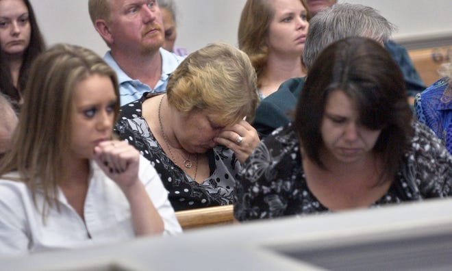 Carl Elmore/Bryan County NowSherry Arthur, mother of Melissa and Heather Arthur, cried quietly surrounded by family and friends in the Bryan County courtroom.