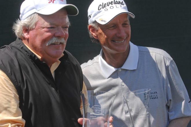 Roger Maltbie and Gary Koch with the Liberty Mutual Legends of Golf Raphael Division trophys. Richard Burkhart/Savannah Morning News