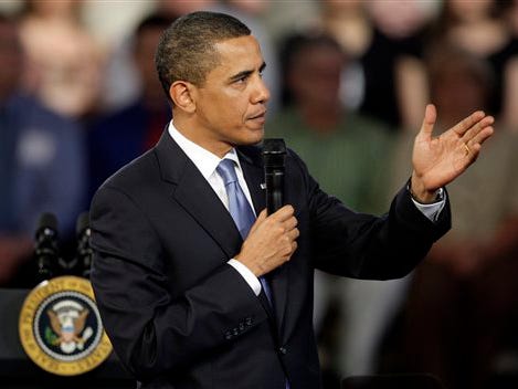 President Barack Obama answers a questions from an audience member during a town hall meeting Wednesday, April 29, 2009, at Fox Senior High School in Arnold, Mo.