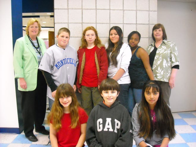From left, top row, are Principal Deborah Wood, Joshua Mace, William Smith, May Rosario, Yazmine Gandulla, and Barbara Hill, RJK Word adviser. Bottom row, Linda Seminario, RJK Word Editor-in-Chief Aaron Weiss, and Cindy Lopez. Absent from the photo: Sandra Bell, Russell Loomis and Larissa Roussos.