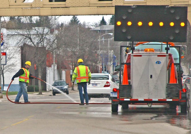 Workers with the Michigan Department of Transportation washed the streets of Downtown Sault Ste. Marie Thursday morning. Here, they concentrated on the Ashmun Street Bridge — spraying off some of the accumulated seasonal grime.