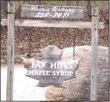 (Left) Far Hills Maple Syrup of Indian River is the largest maple syrup produc­er in Michigan and owner Craig Waldron has plans to expand the operation in the near future. This Far Hills produced 8,600 gallons of maple syrup.