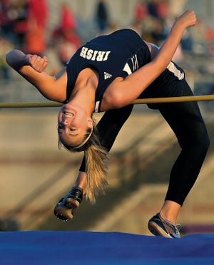 Notre Dame high jumper Taylor Amberg leaps at the East Peoria Meet of Champions at EastSide Centre. Amberg won the event on Friday night in a jumpoff with Morton's Kelsey Kirk.