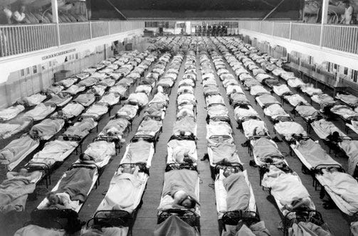 Military bases were particularly hard hit by the influenza pandemic of 1918. his is the scene at the Naval Training Station in San Francisco, Calif.